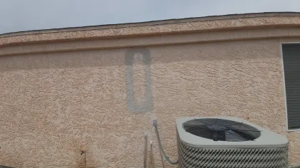 Upon completion the wall is repaired, stucco, textured, and ready for paint